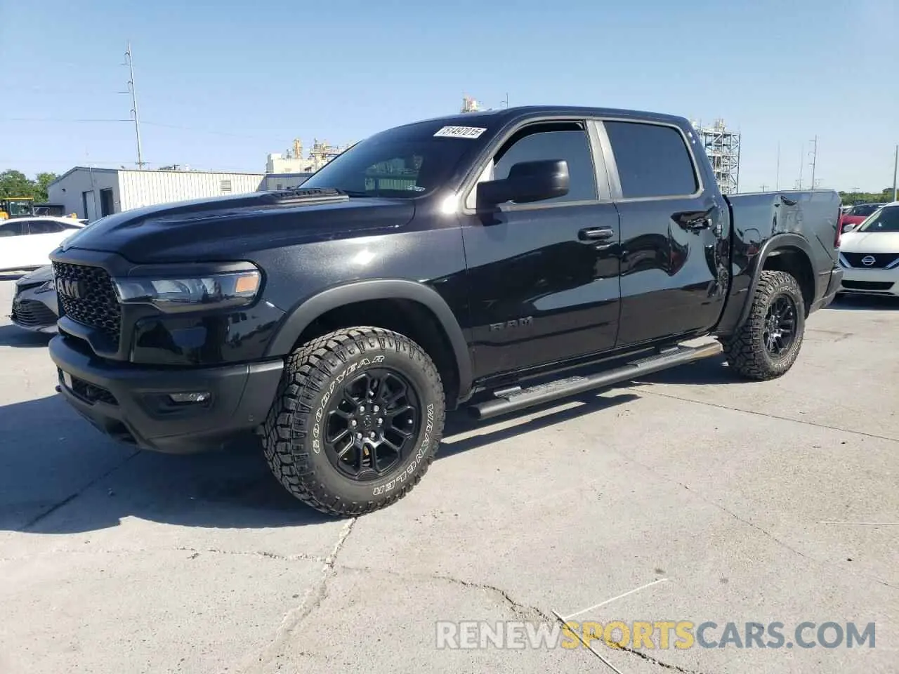 1 Photograph of a damaged car 1C6SRFLP1SN648938 RAM 1500 2025