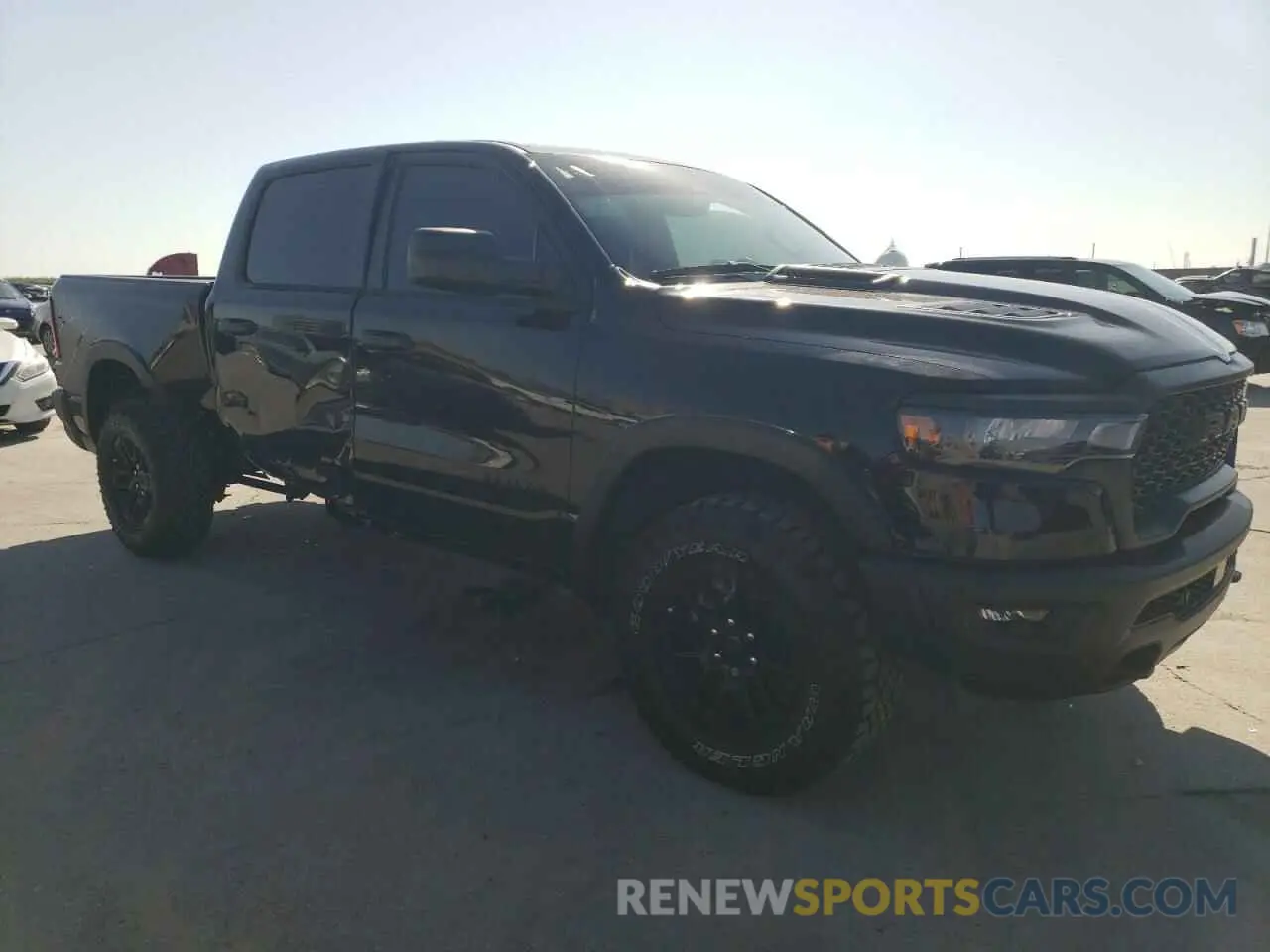 4 Photograph of a damaged car 1C6SRFLP1SN648938 RAM 1500 2025