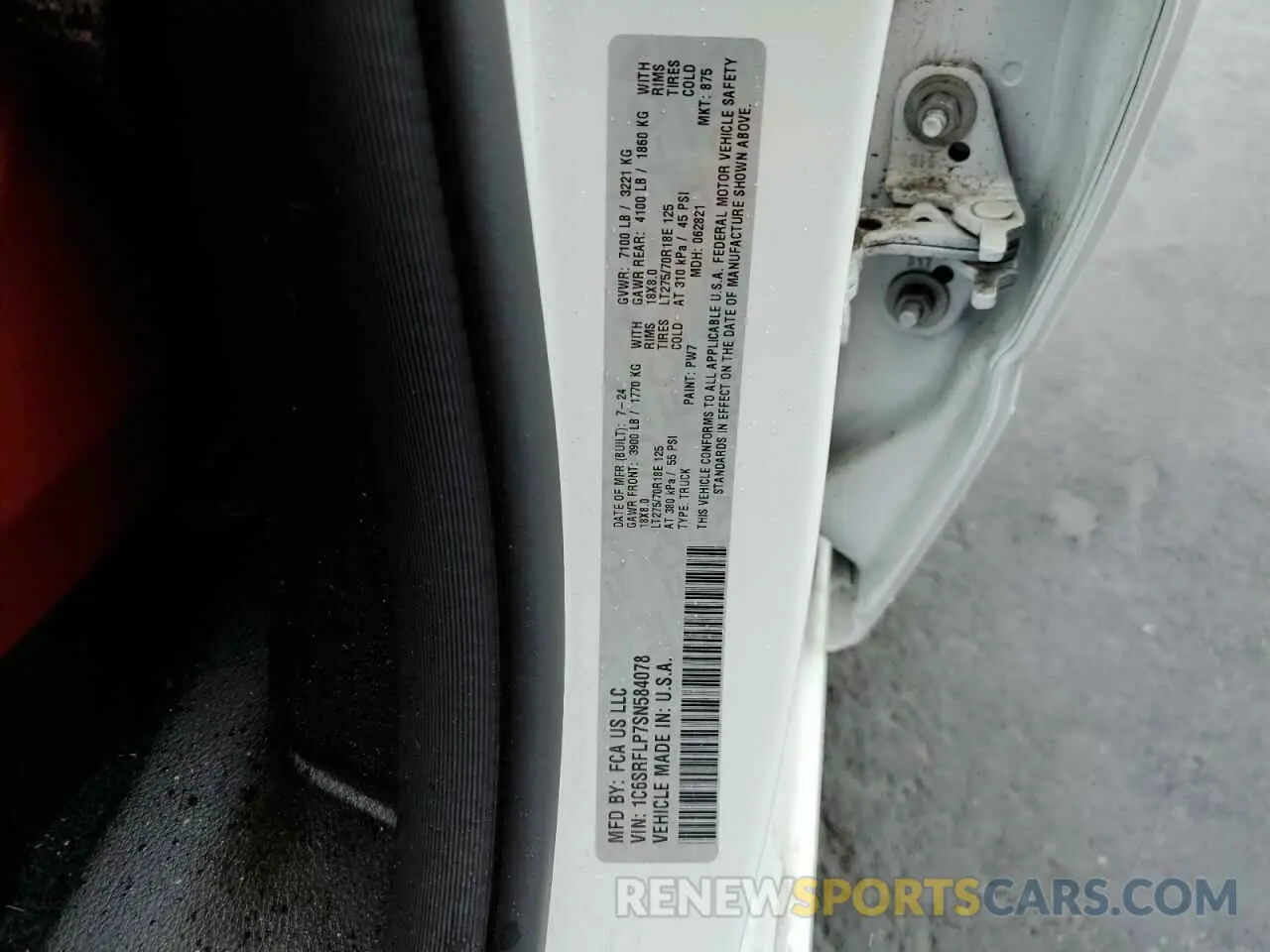 12 Photograph of a damaged car 1C6SRFLP7SN584078 RAM 1500 2025