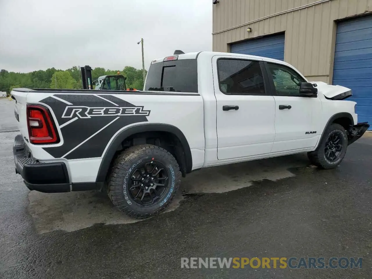 3 Photograph of a damaged car 1C6SRFLP7SN584078 RAM 1500 2025