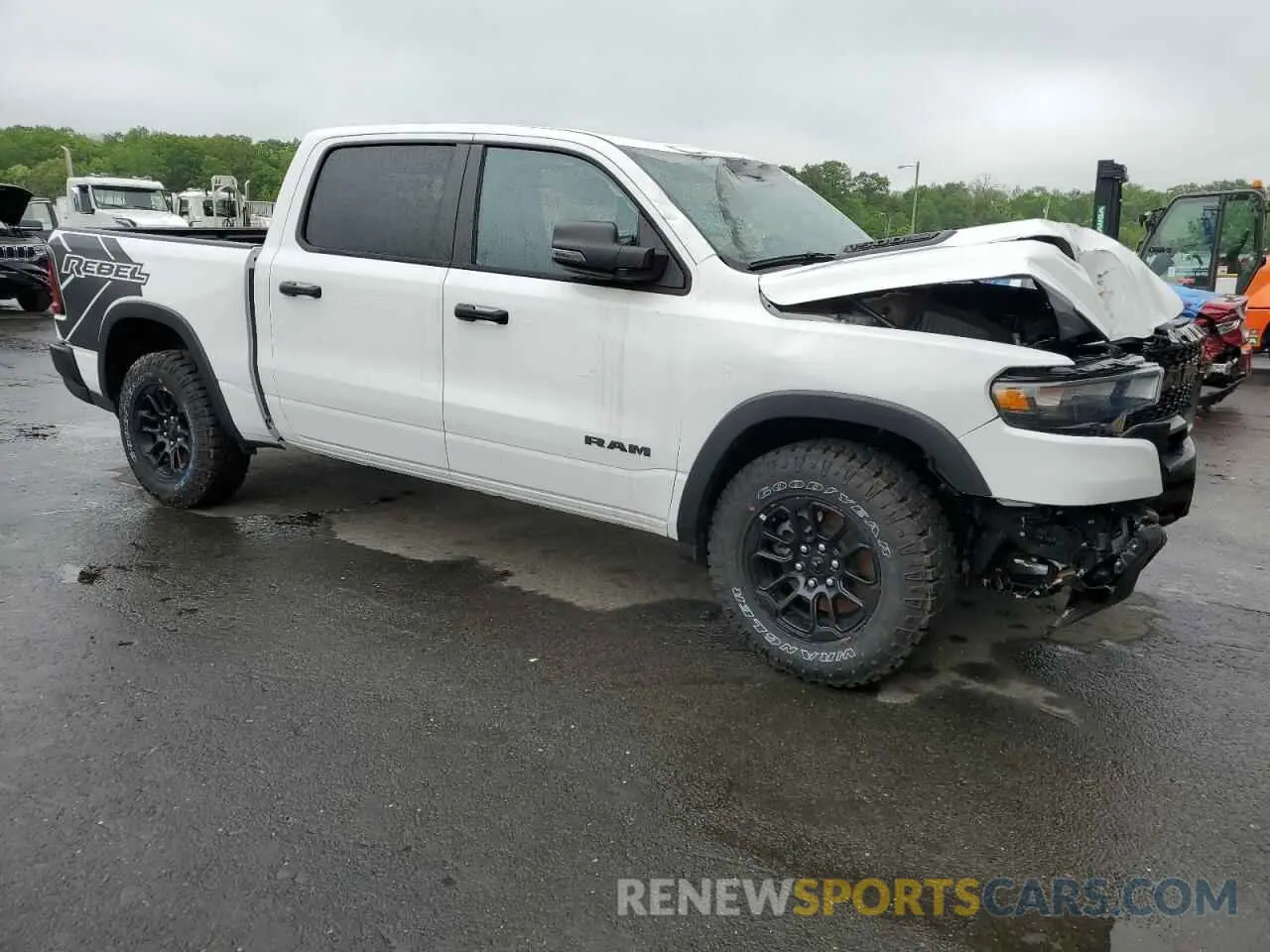 4 Photograph of a damaged car 1C6SRFLP7SN584078 RAM 1500 2025