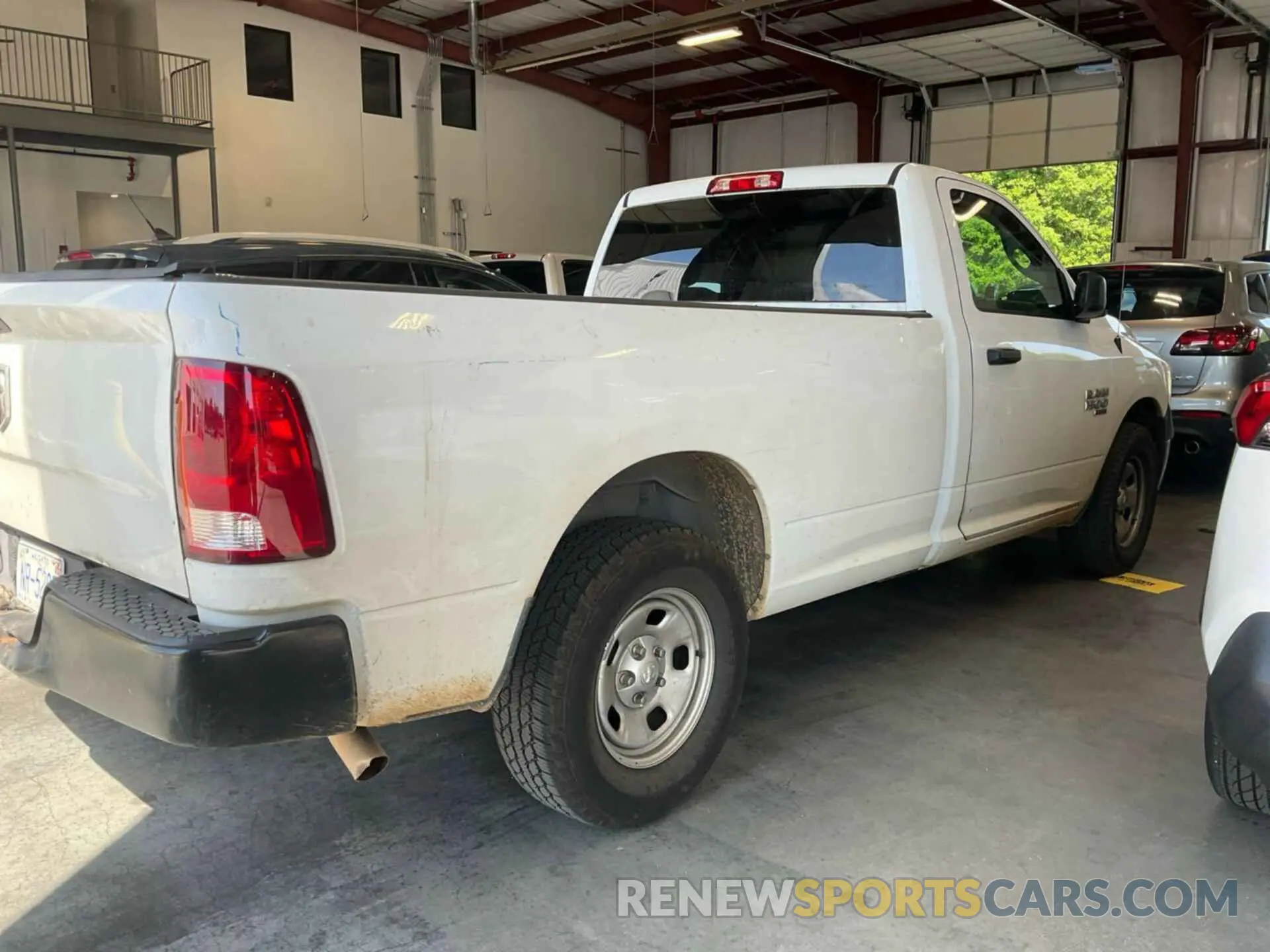 11 Photograph of a damaged car 3C6JR6DG0NG300832 RAM 1500 CLASSIC 2022