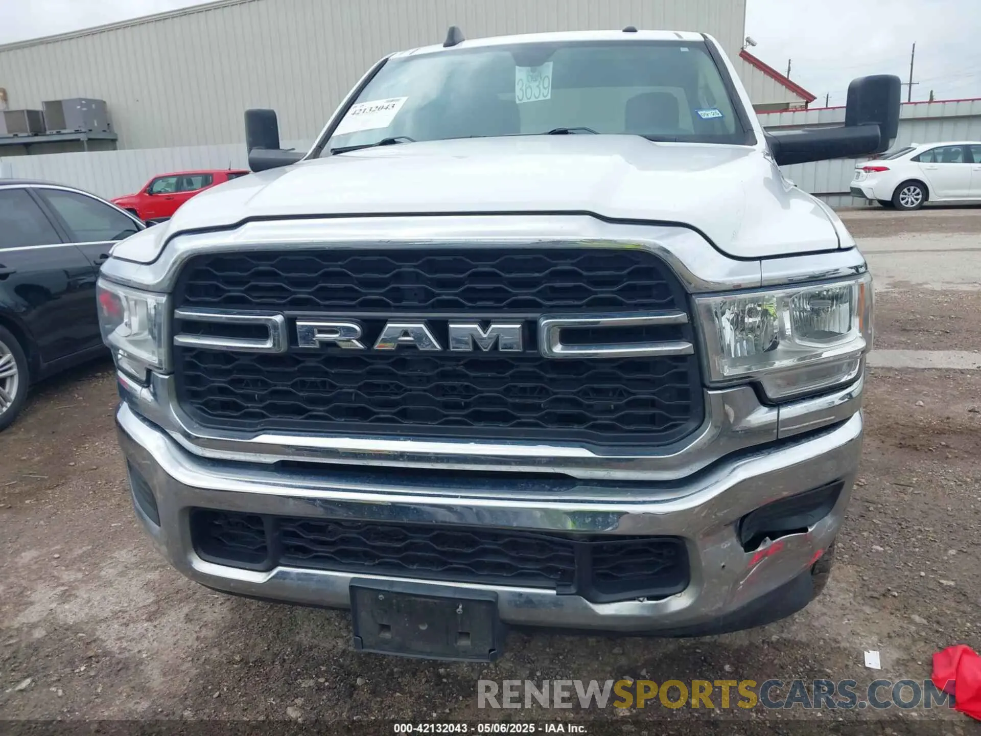 13 Photograph of a damaged car 3C6UR4HJ9KG646011 RAM 2500 2019