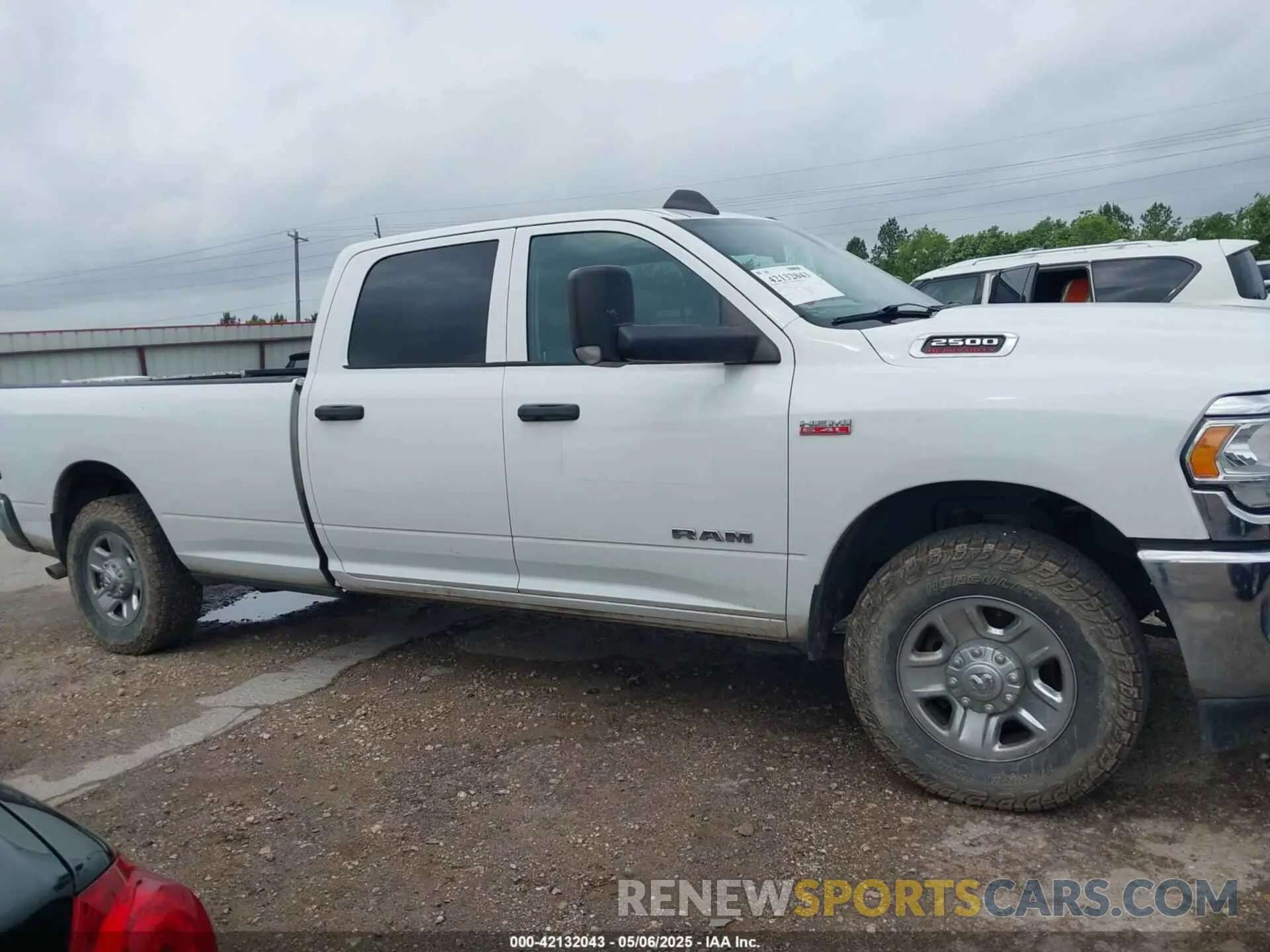 14 Photograph of a damaged car 3C6UR4HJ9KG646011 RAM 2500 2019