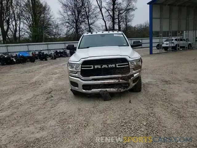 11 Photograph of a damaged car 3C6UR5CJ0KG633399 RAM 2500 2019