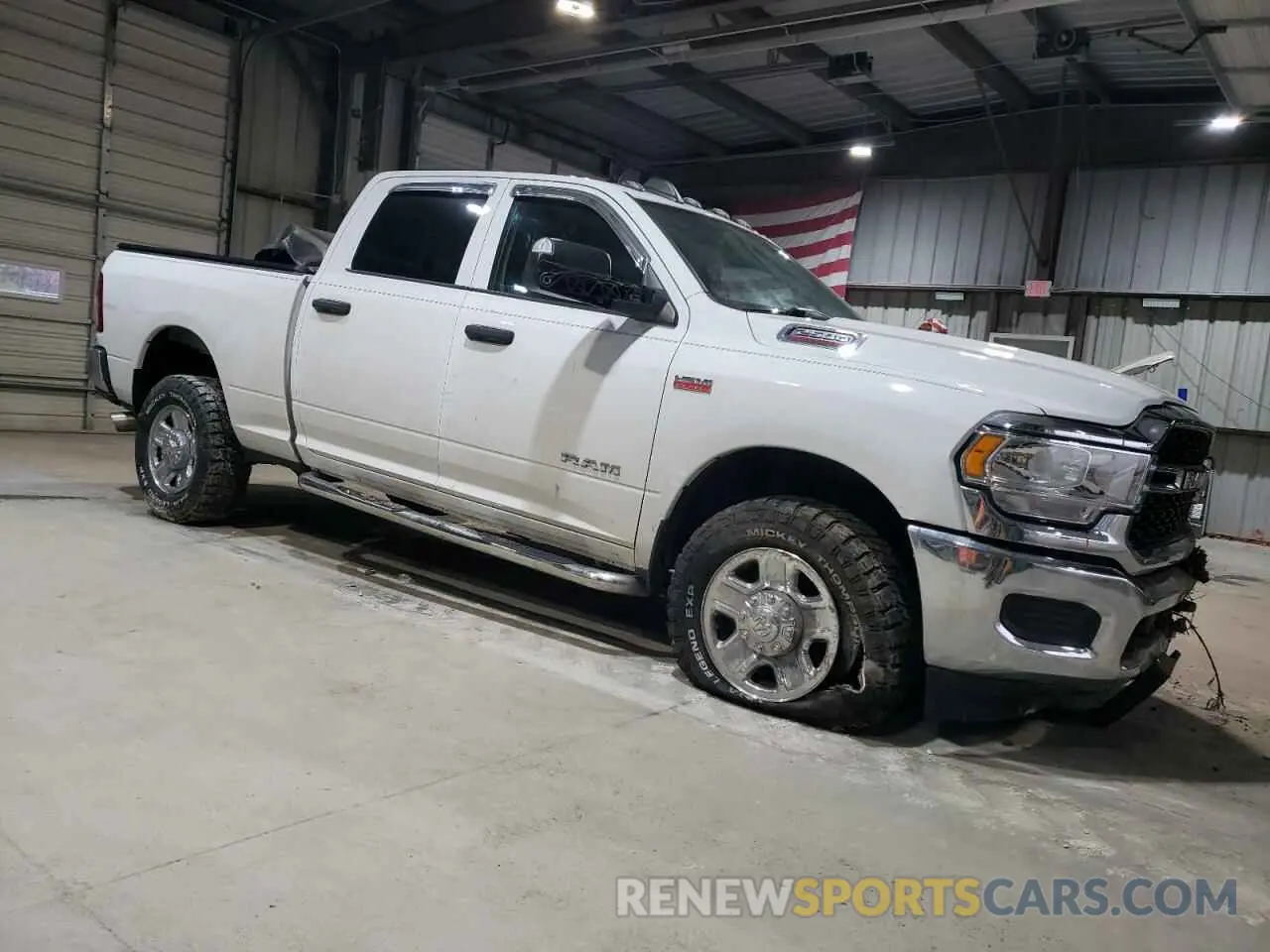 4 Photograph of a damaged car 3C6UR5CJ0KG633399 RAM 2500 2019