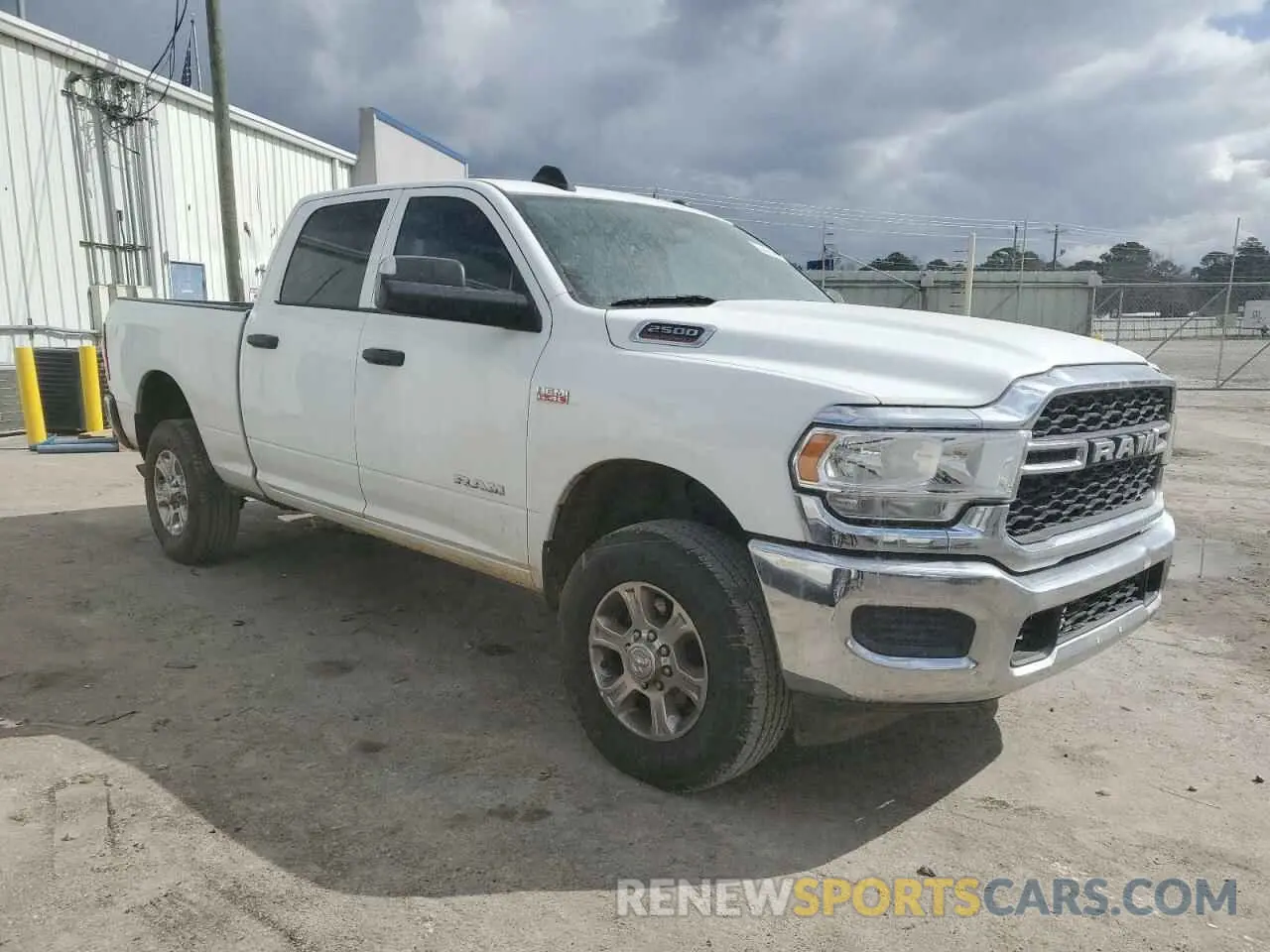4 Photograph of a damaged car 3C6UR5CJ2KG565445 RAM 2500 2019