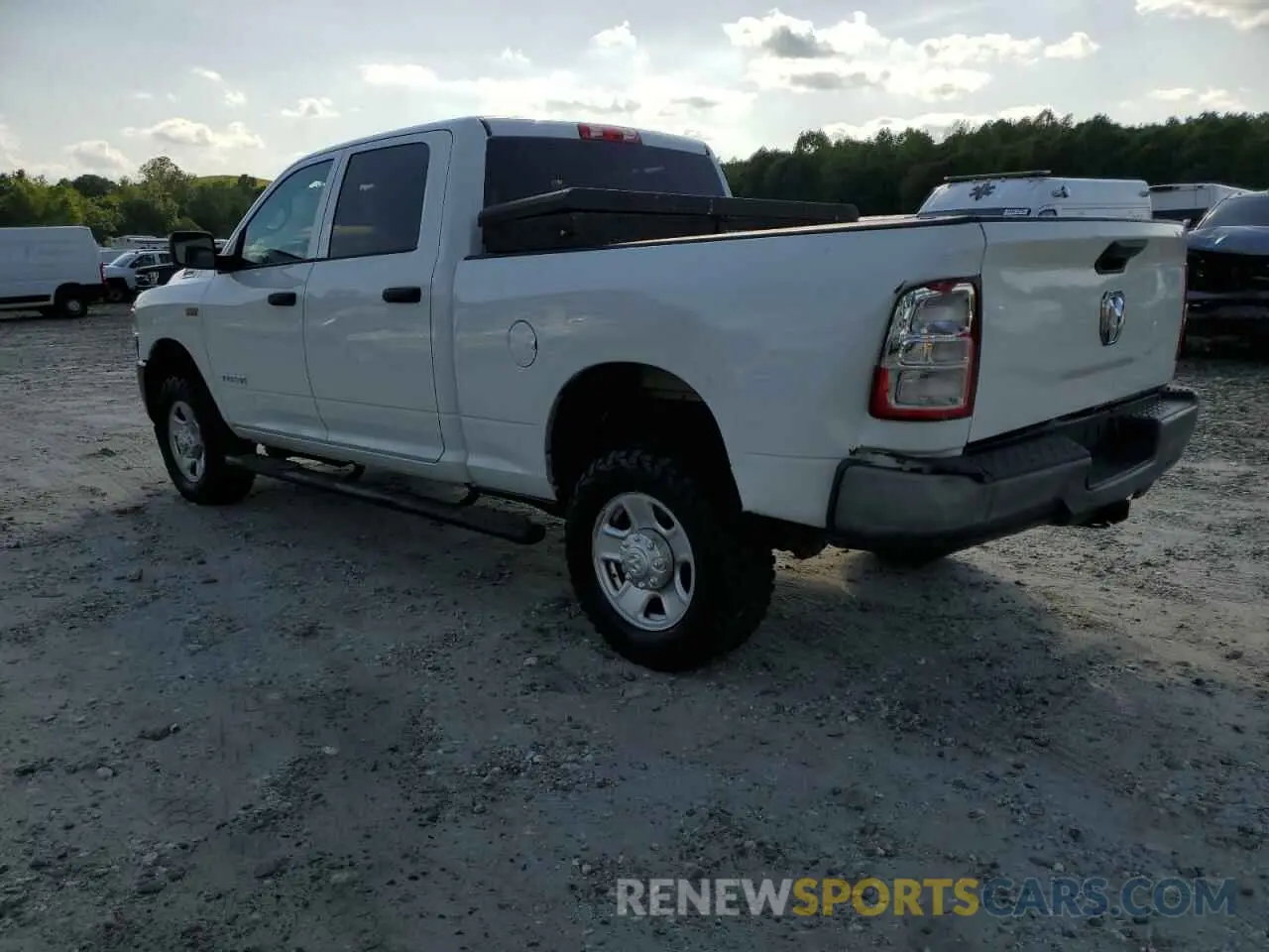 2 Photograph of a damaged car 3C6UR5CJ2KG574713 RAM 2500 2019