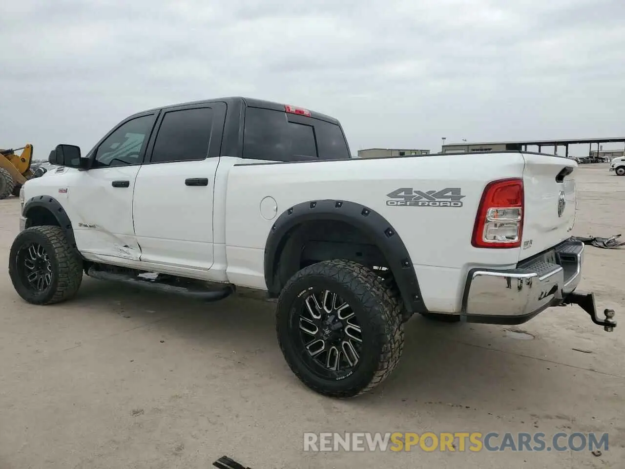 2 Photograph of a damaged car 3C6UR5CJ4KG667037 RAM 2500 2019