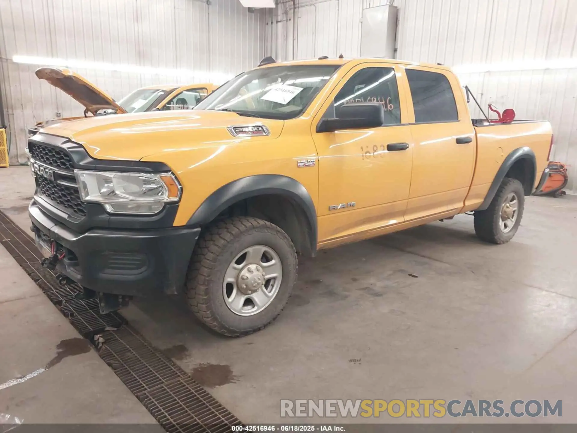 2 Photograph of a damaged car 3C6UR5CJ6KG620320 RAM 2500 2019