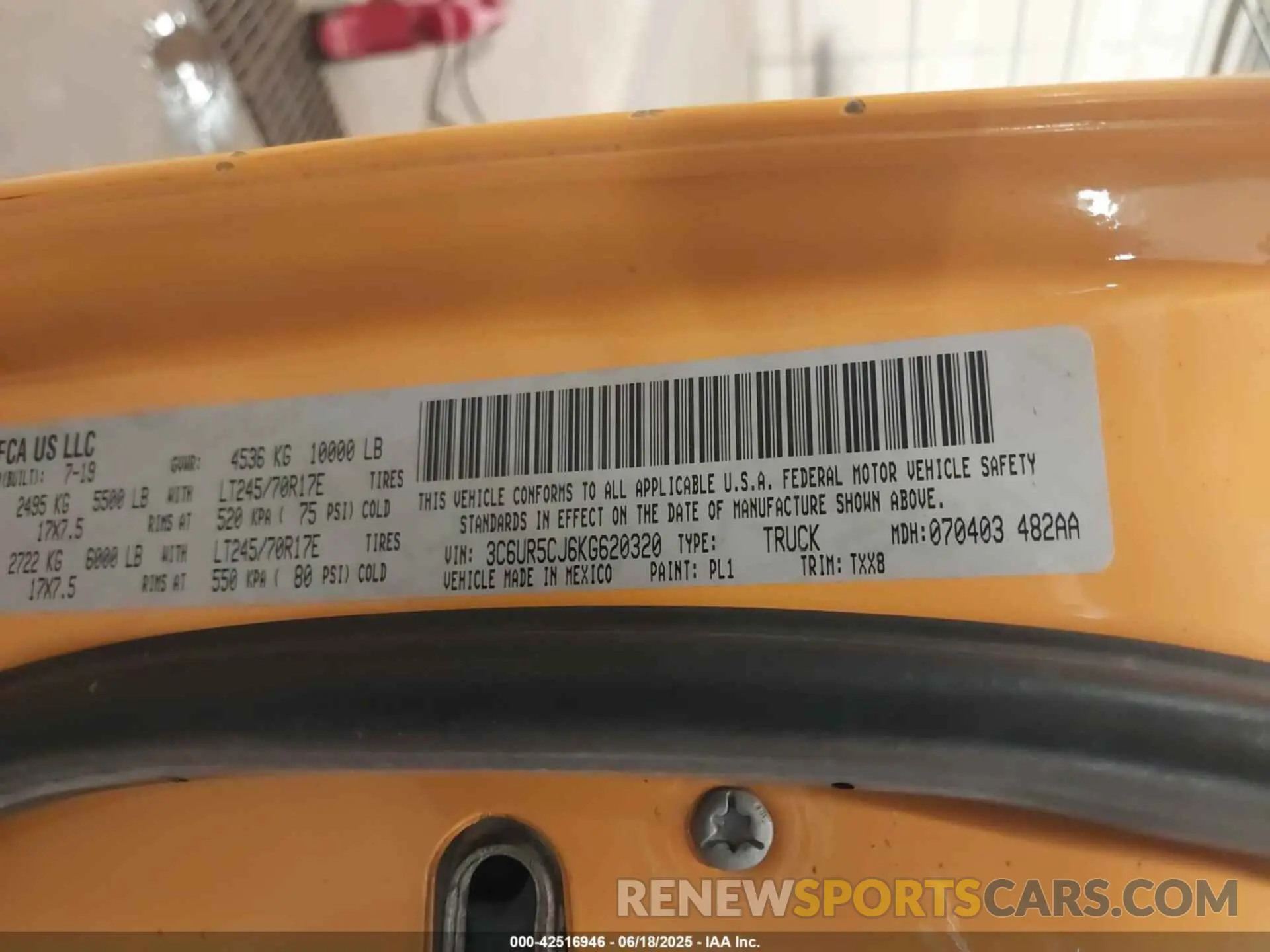 9 Photograph of a damaged car 3C6UR5CJ6KG620320 RAM 2500 2019