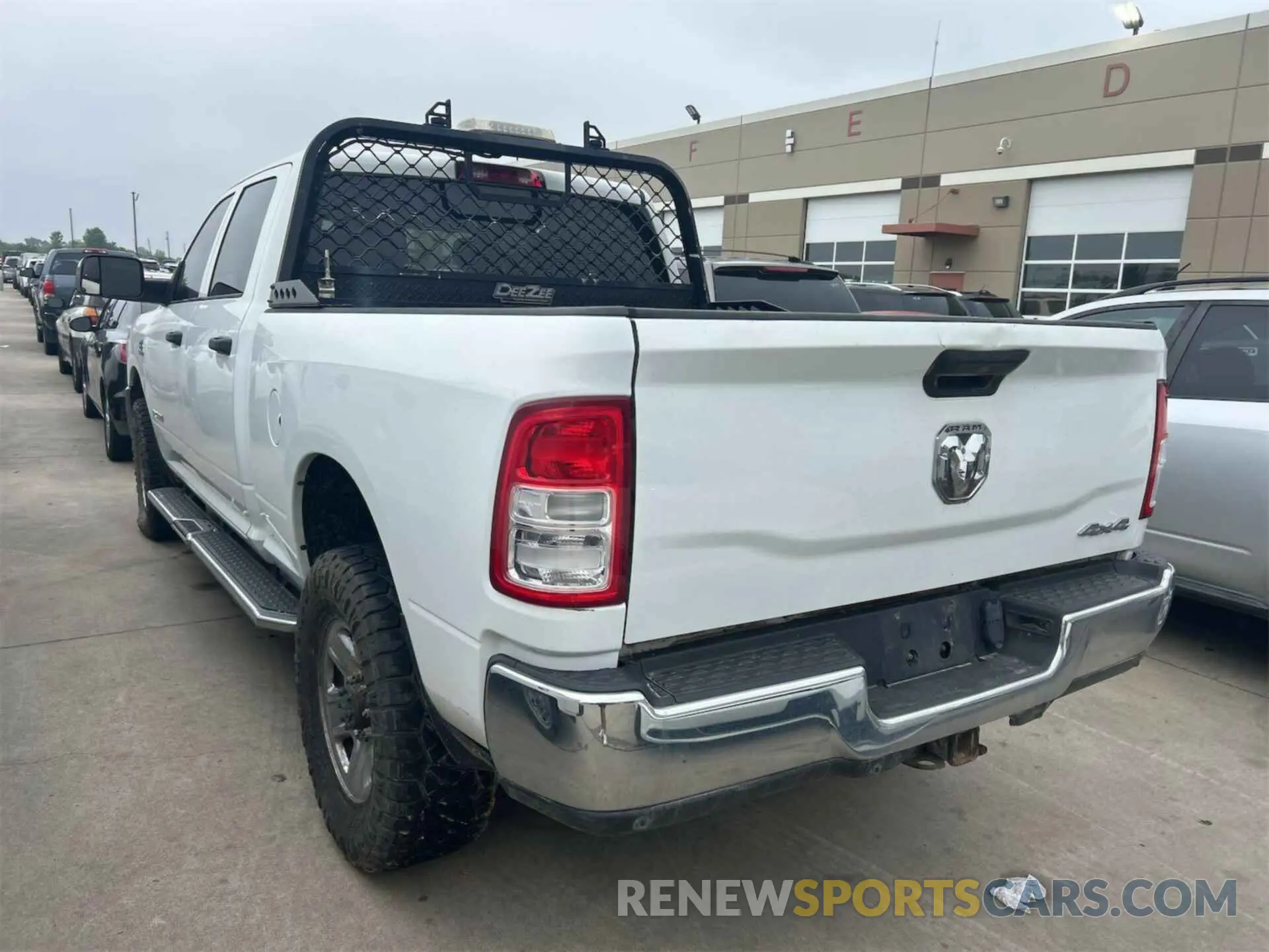 11 Photograph of a damaged car 3C6UR5CL4KG598108 RAM 2500 2019