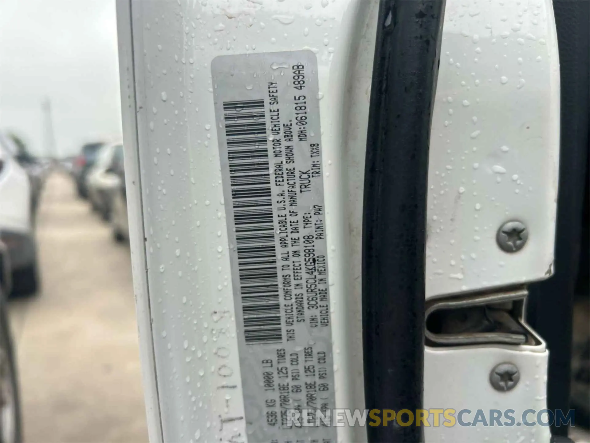 22 Photograph of a damaged car 3C6UR5CL4KG598108 RAM 2500 2019