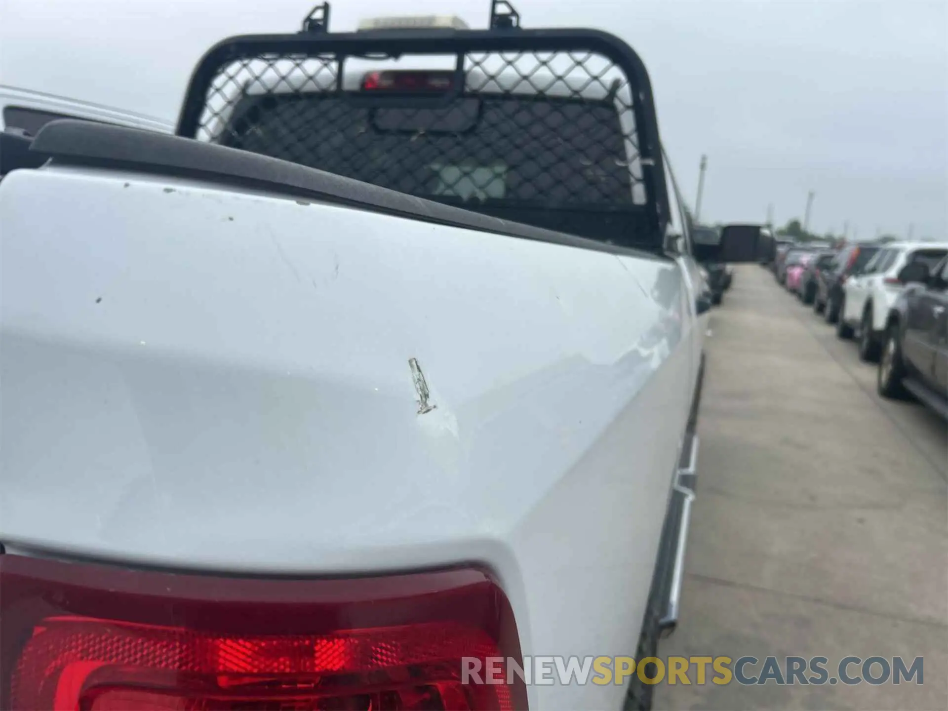 3 Photograph of a damaged car 3C6UR5CL4KG598108 RAM 2500 2019