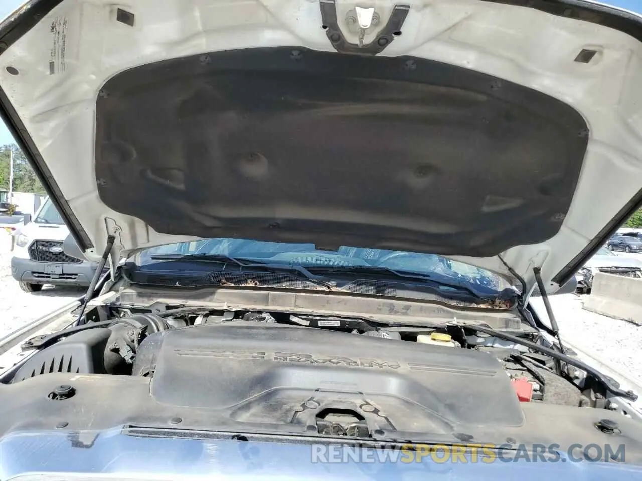 11 Photograph of a damaged car 3C6UR5CL7KG576779 RAM 2500 2019