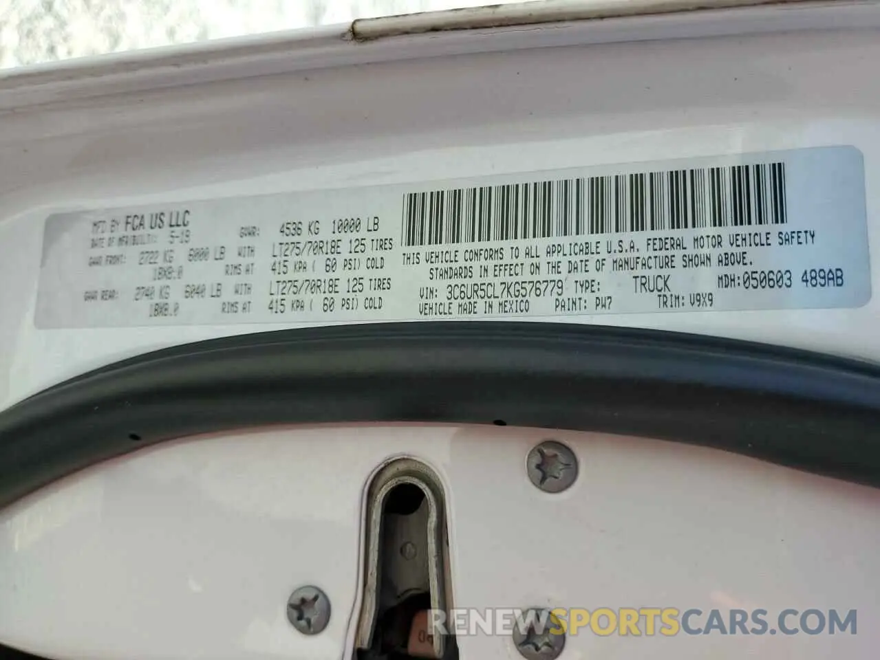 12 Photograph of a damaged car 3C6UR5CL7KG576779 RAM 2500 2019