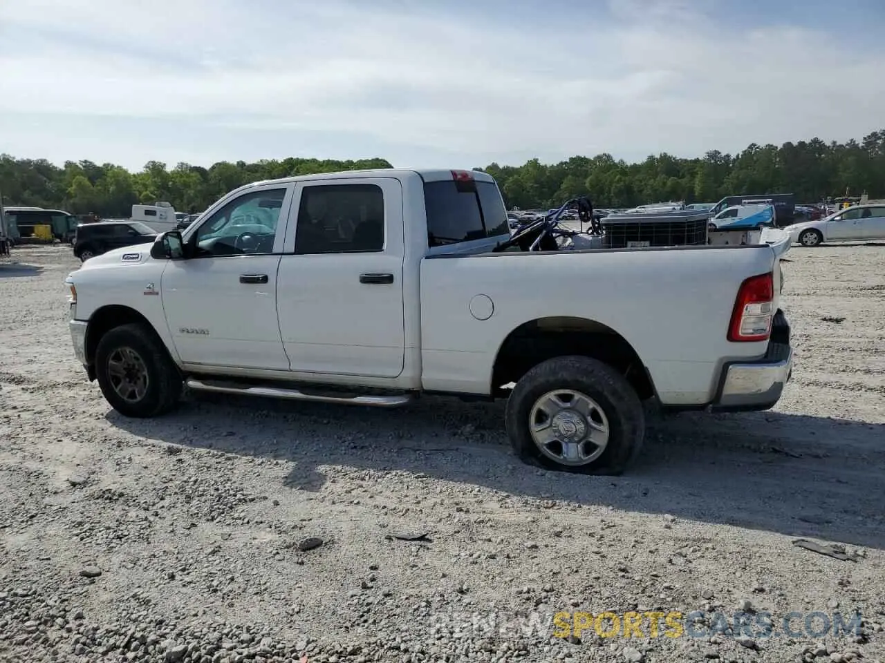2 Photograph of a damaged car 3C6UR5CL7KG576779 RAM 2500 2019