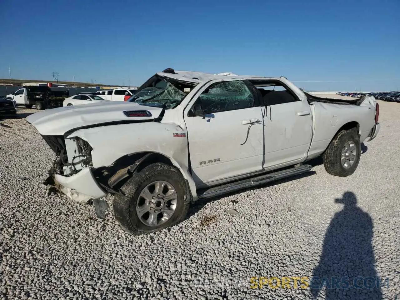 1 Photograph of a damaged car 3C6UR5DJ1KG697868 RAM 2500 2019