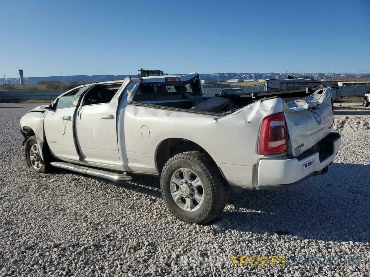 2 Photograph of a damaged car 3C6UR5DJ1KG697868 RAM 2500 2019