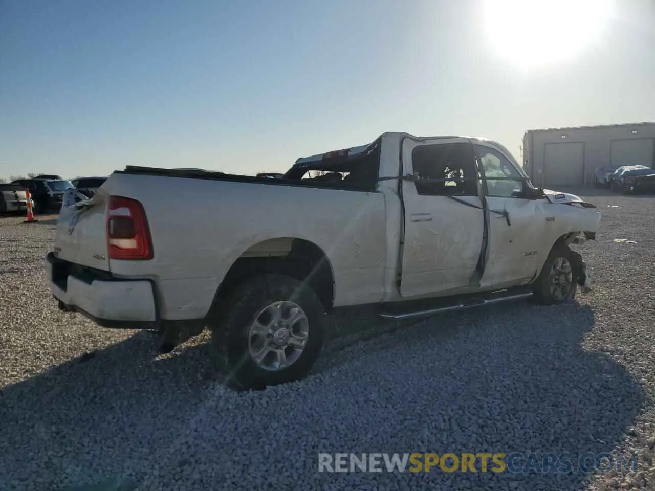 3 Photograph of a damaged car 3C6UR5DJ1KG697868 RAM 2500 2019