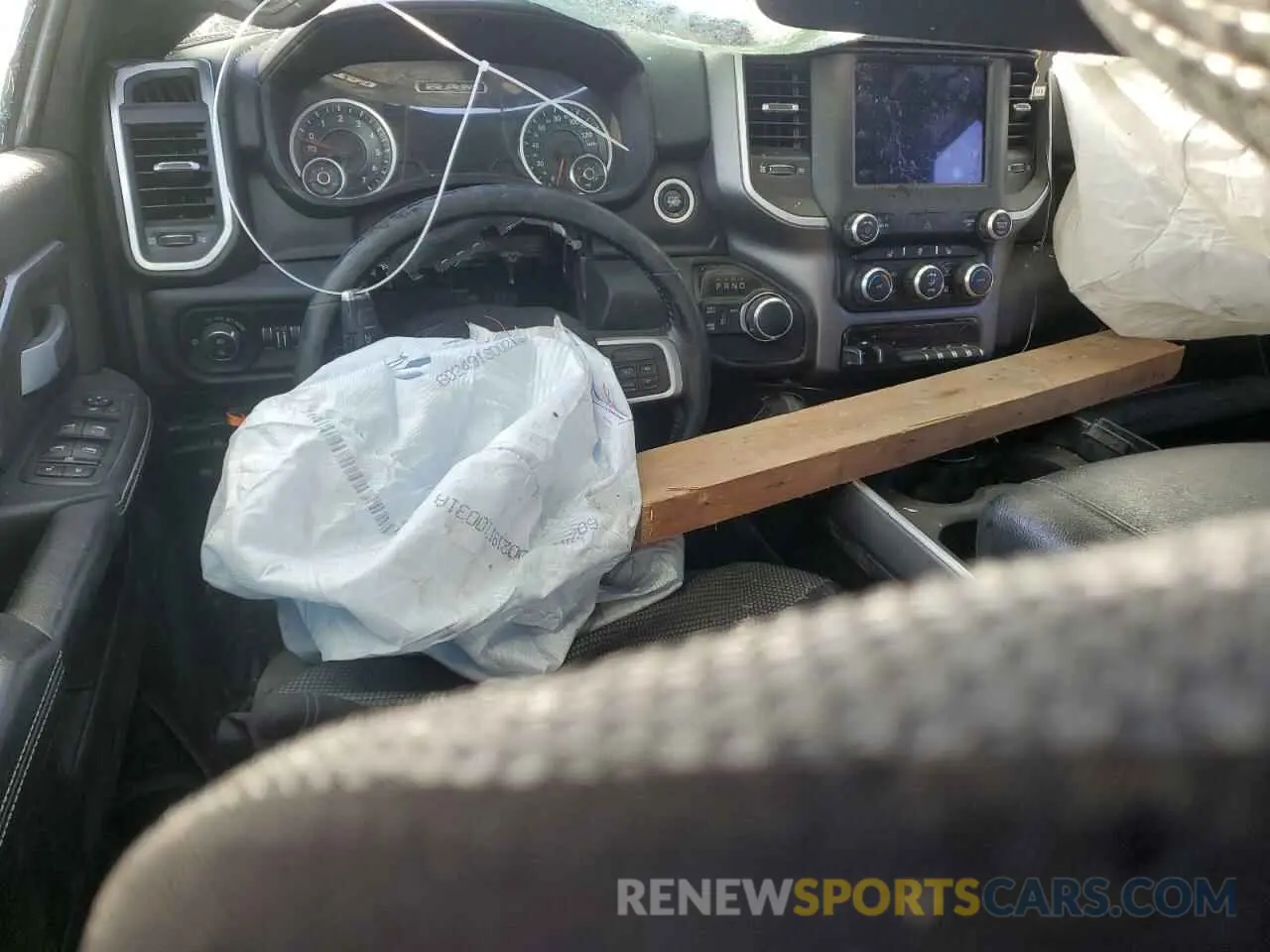 8 Photograph of a damaged car 3C6UR5DJ1KG697868 RAM 2500 2019