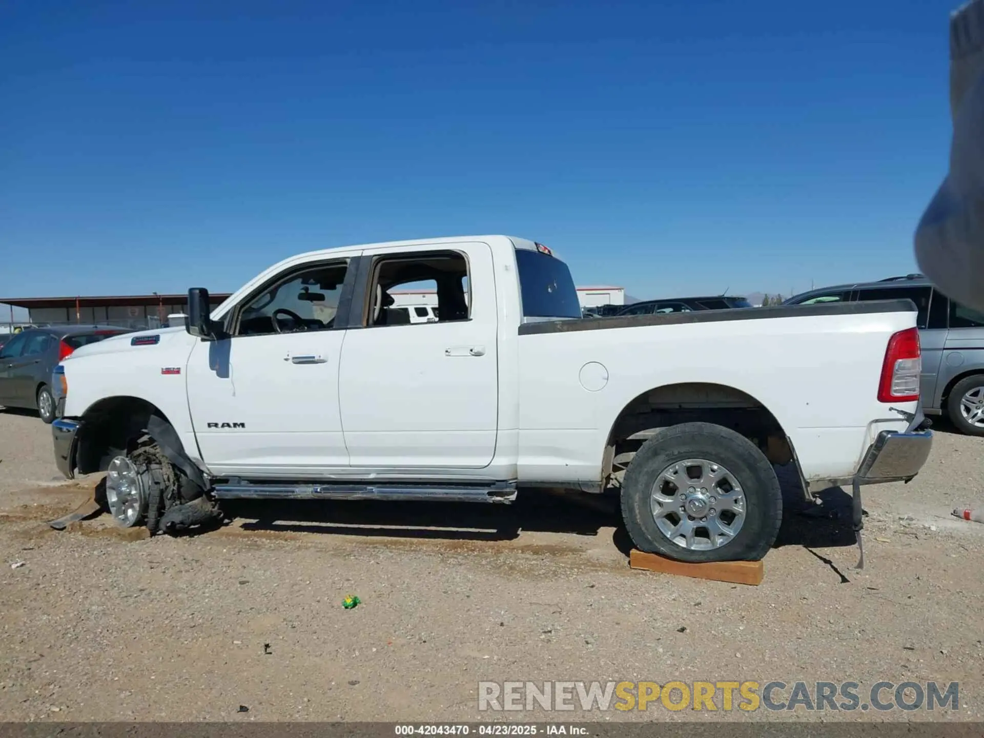 13 Photograph of a damaged car 3C6UR5DJ6KG544421 RAM 2500 2019