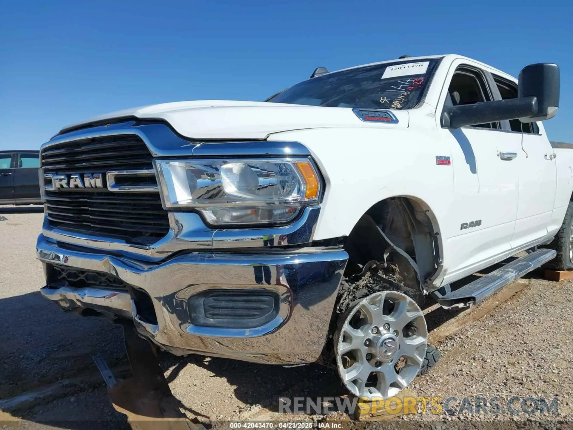 19 Photograph of a damaged car 3C6UR5DJ6KG544421 RAM 2500 2019