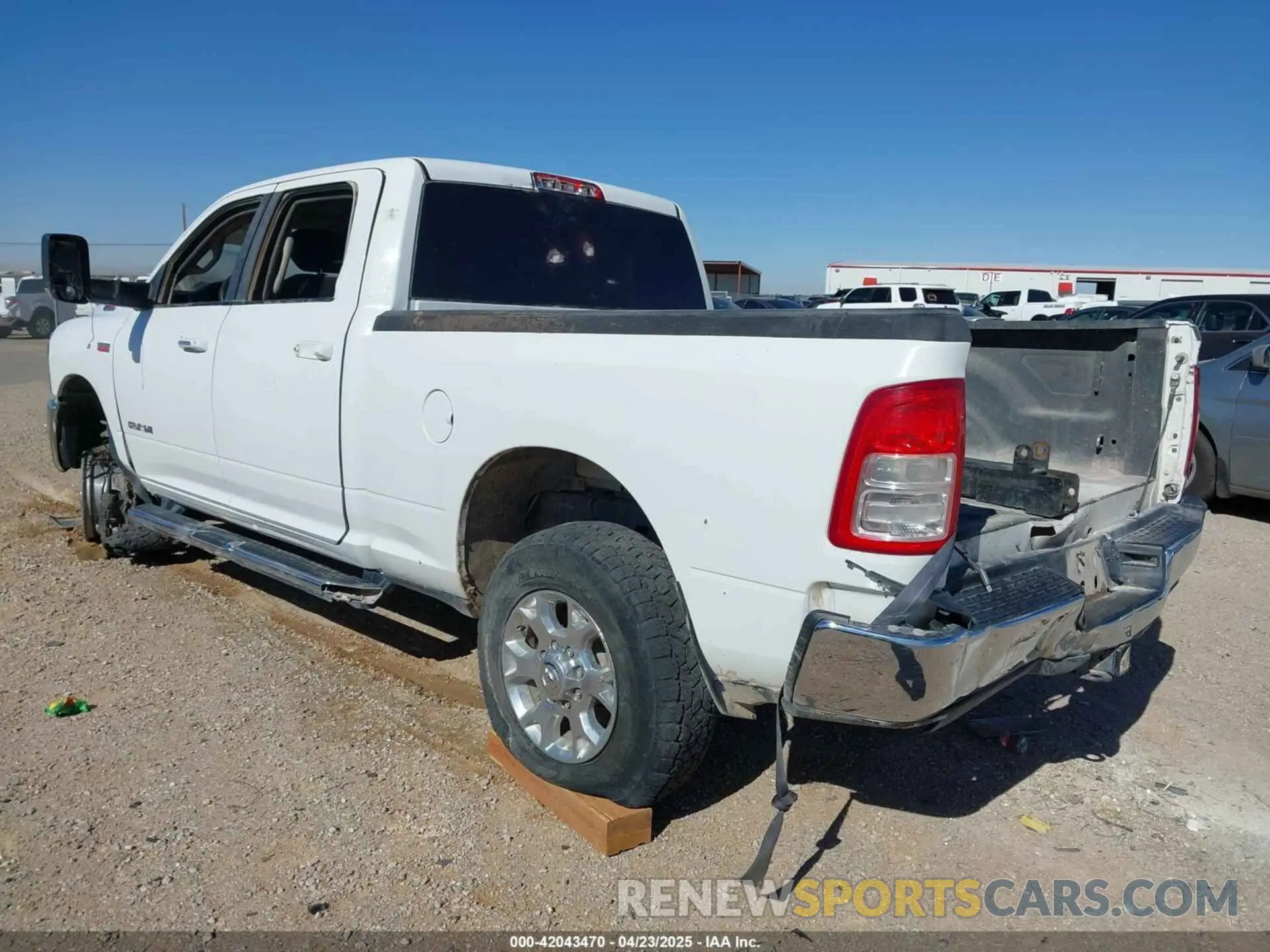 3 Photograph of a damaged car 3C6UR5DJ6KG544421 RAM 2500 2019