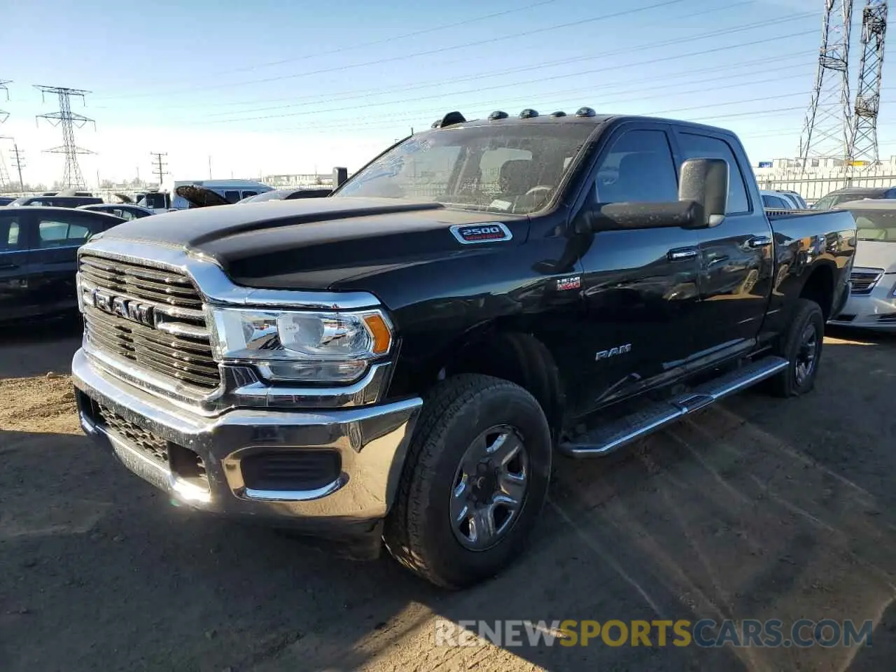 1 Photograph of a damaged car 3C6UR5DJ6KG611129 RAM 2500 2019
