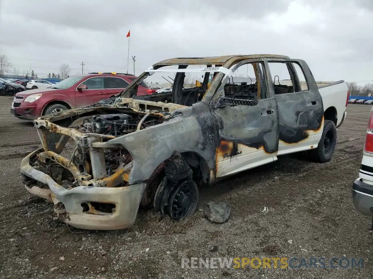 1 Photograph of a damaged car 3C6UR5DL6KG517981 RAM 2500 2019