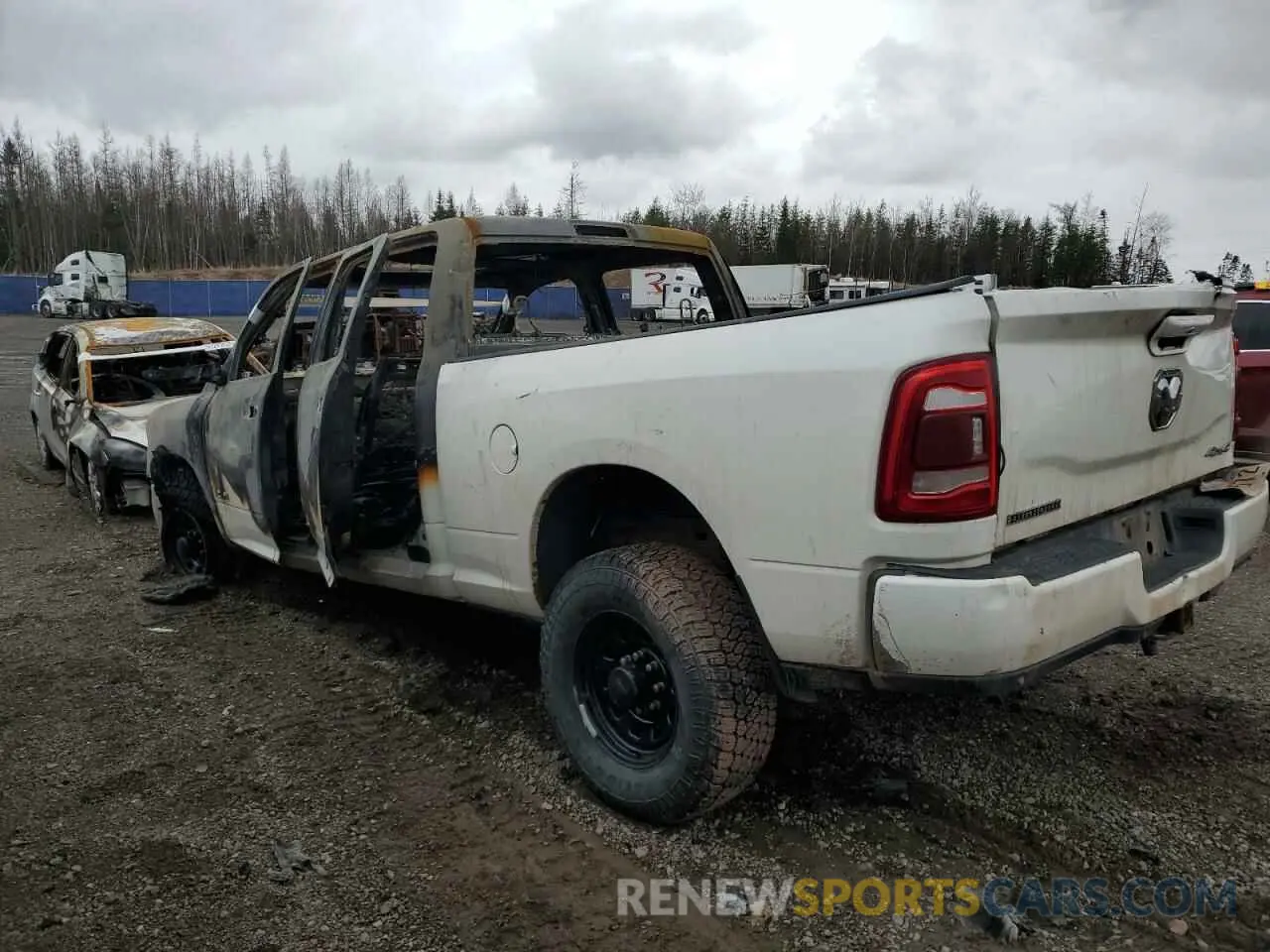 2 Photograph of a damaged car 3C6UR5DL6KG517981 RAM 2500 2019