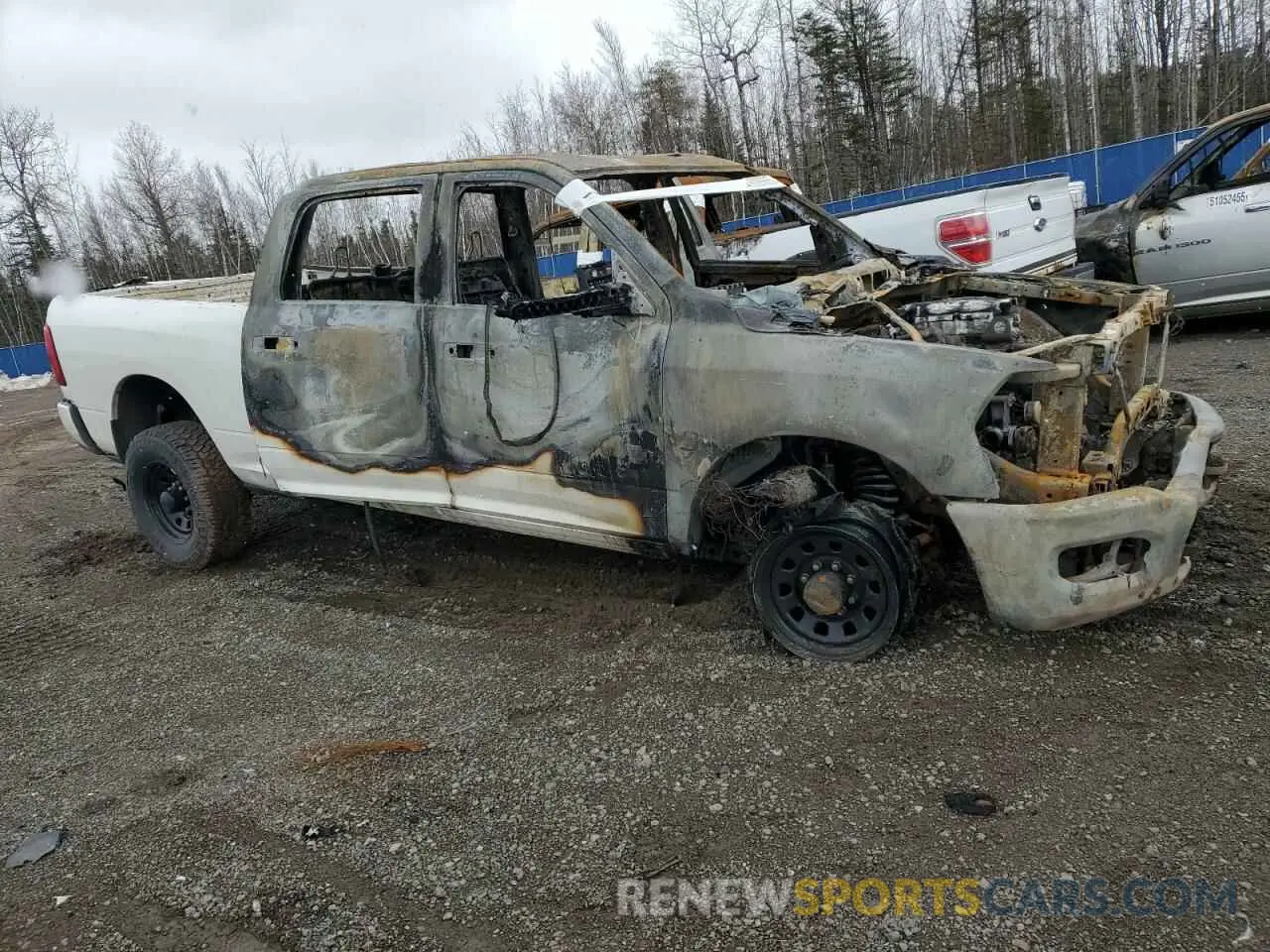 4 Photograph of a damaged car 3C6UR5DL6KG517981 RAM 2500 2019