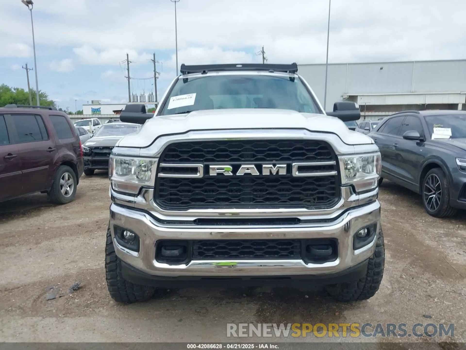 12 Photograph of a damaged car 3C6UR5DL7KG587151 RAM 2500 2019