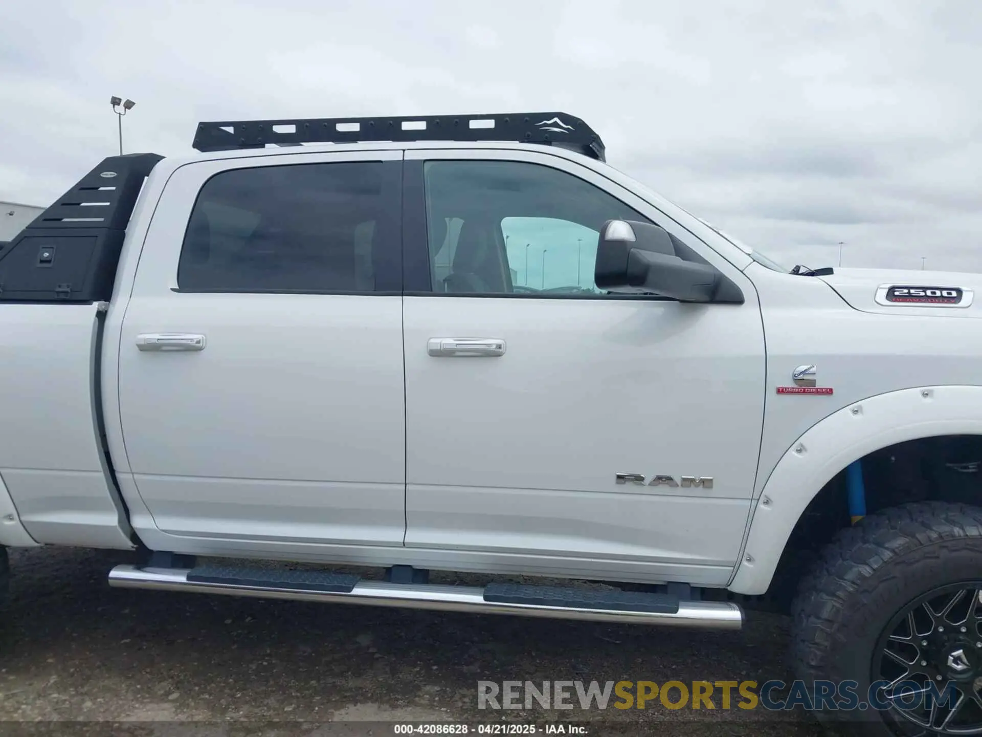 13 Photograph of a damaged car 3C6UR5DL7KG587151 RAM 2500 2019
