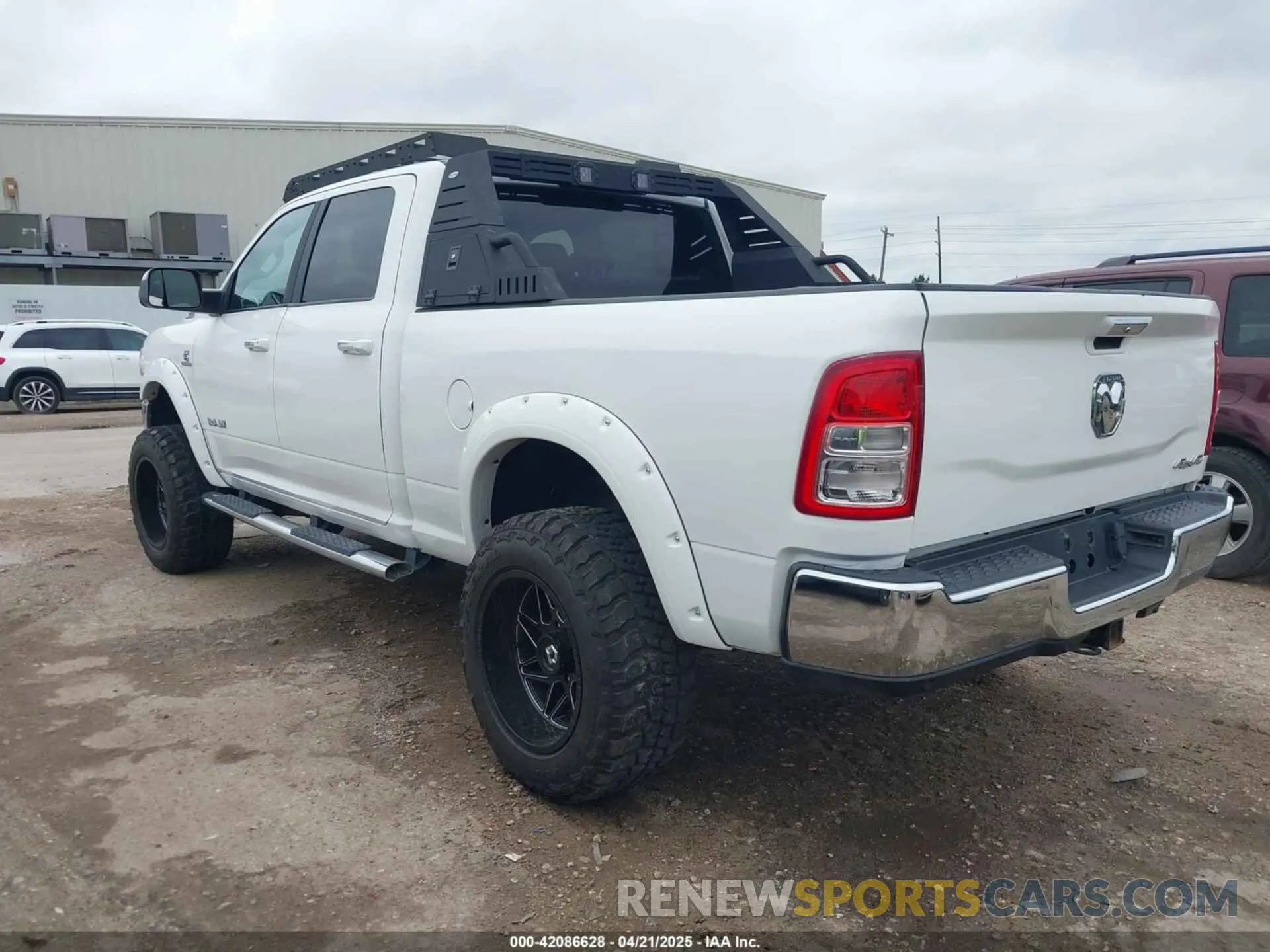 3 Photograph of a damaged car 3C6UR5DL7KG587151 RAM 2500 2019