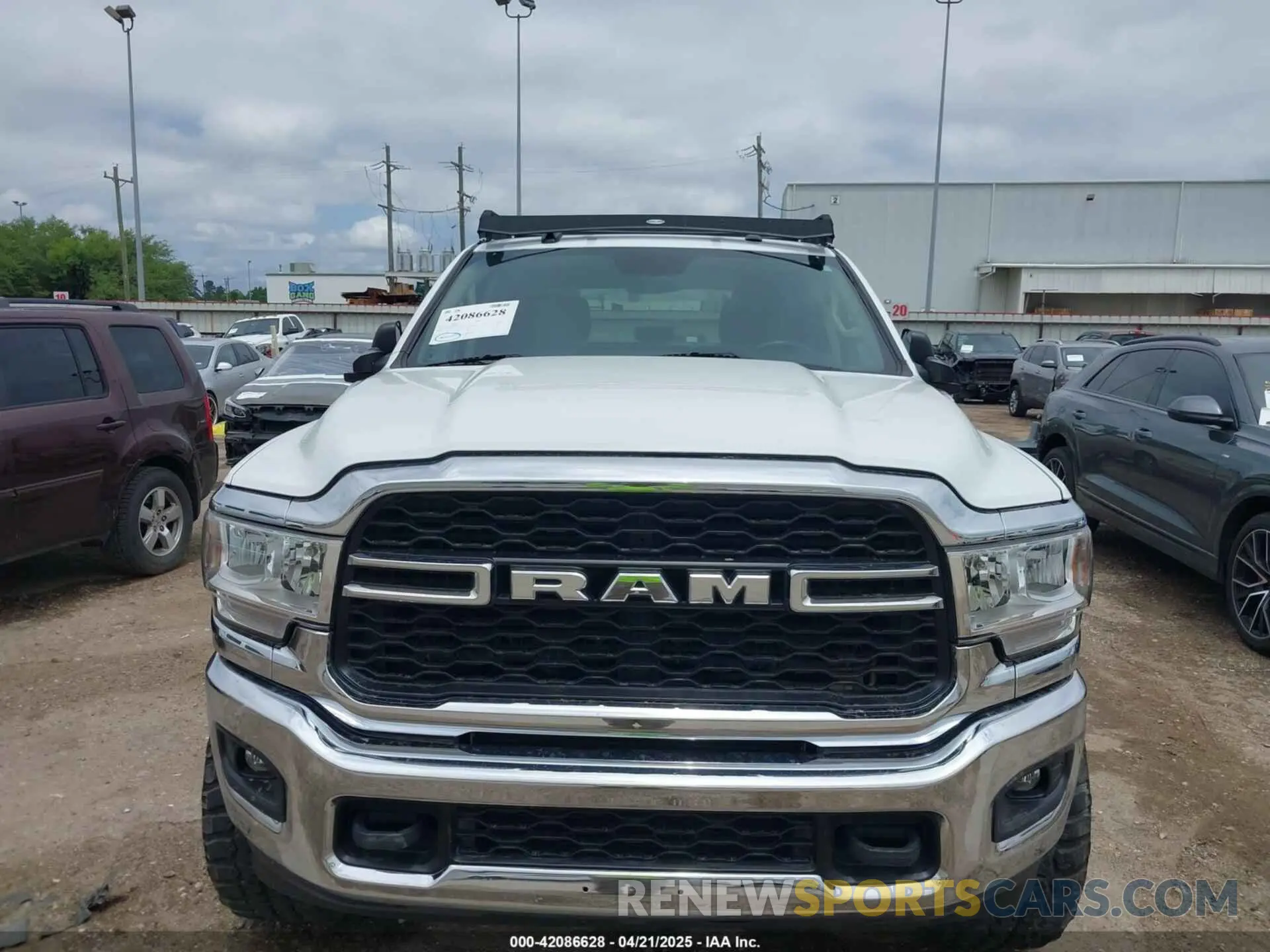 6 Photograph of a damaged car 3C6UR5DL7KG587151 RAM 2500 2019