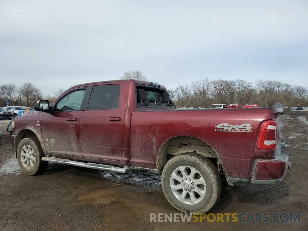 2 Photograph of a damaged car 3C6UR5DL8KG608735 RAM 2500 2019