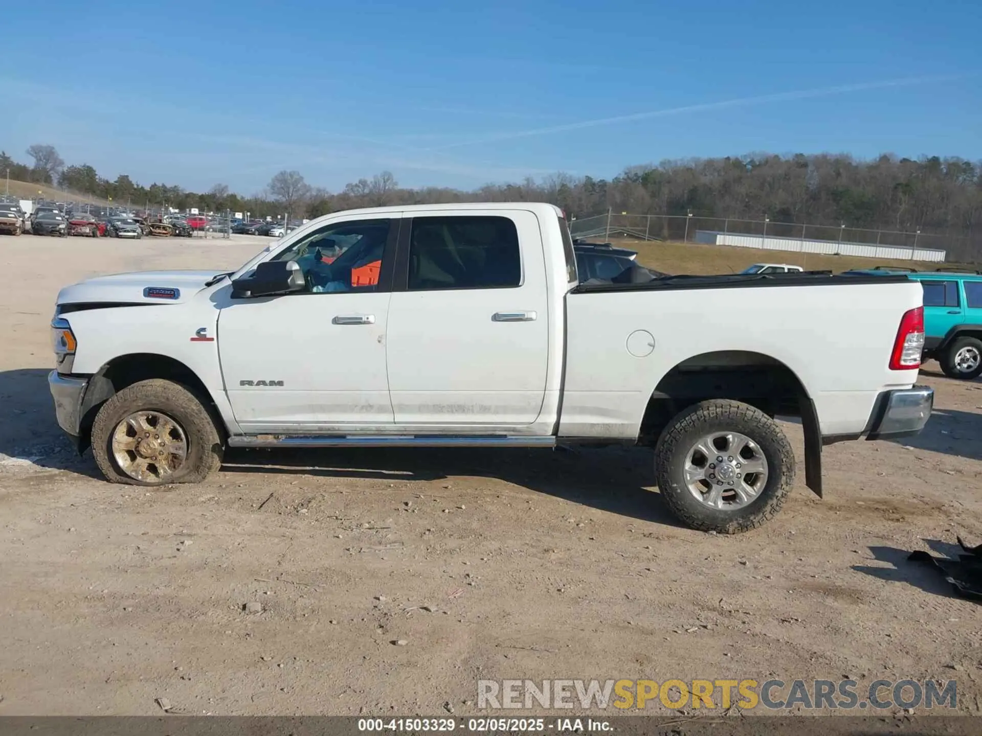 14 Photograph of a damaged car 3C6UR5DLXKG669438 RAM 2500 2019