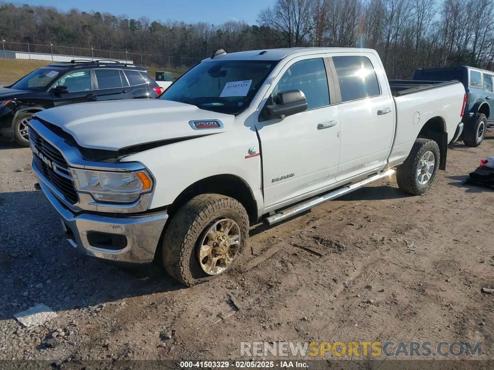 2 Photograph of a damaged car 3C6UR5DLXKG669438 RAM 2500 2019