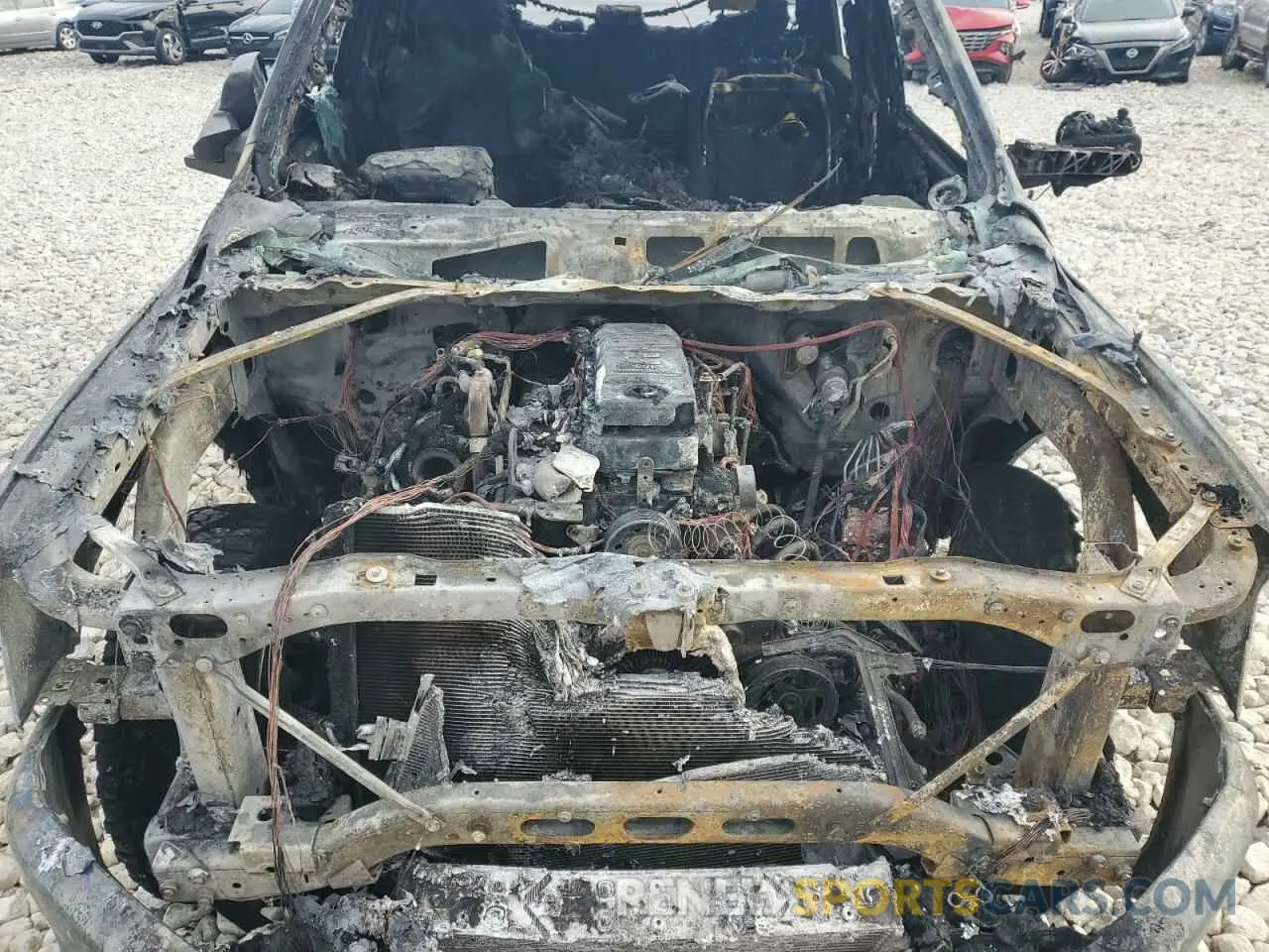 11 Photograph of a damaged car 3C6UR5DLXKG680326 RAM 2500 2019