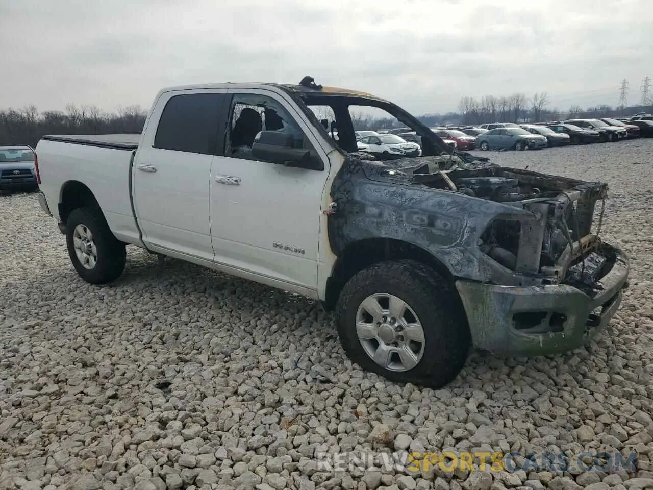 4 Photograph of a damaged car 3C6UR5DLXKG680326 RAM 2500 2019
