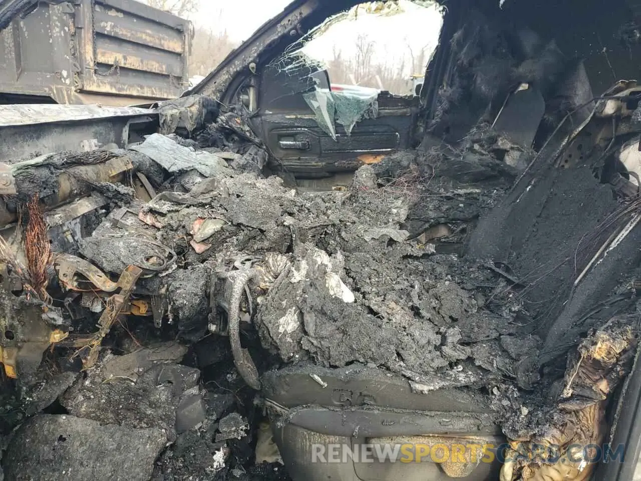 7 Photograph of a damaged car 3C6UR5DLXKG680326 RAM 2500 2019