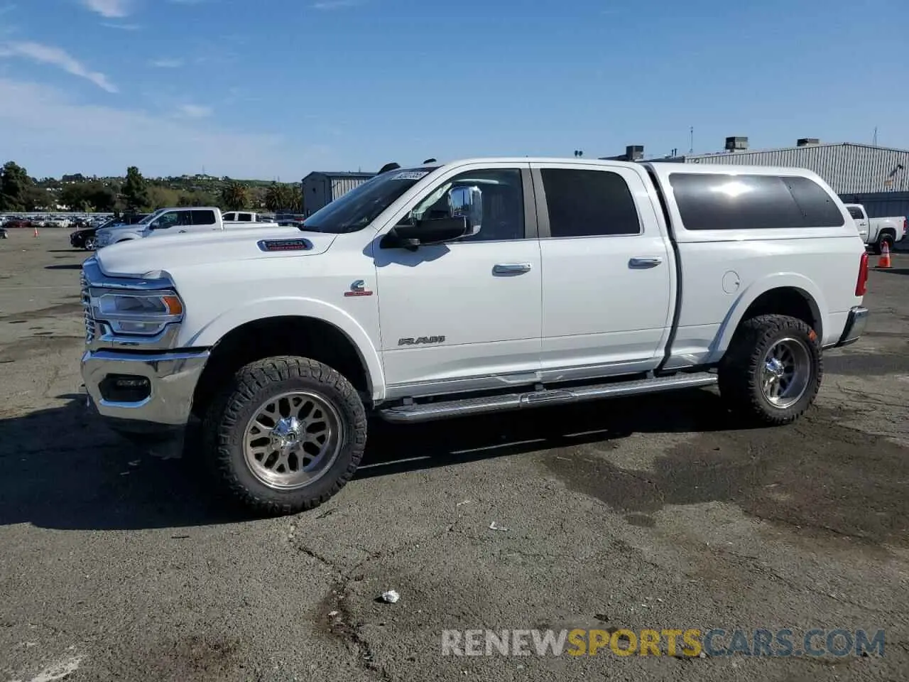 1 Photograph of a damaged car 3C6UR5FL3KG553723 RAM 2500 2019
