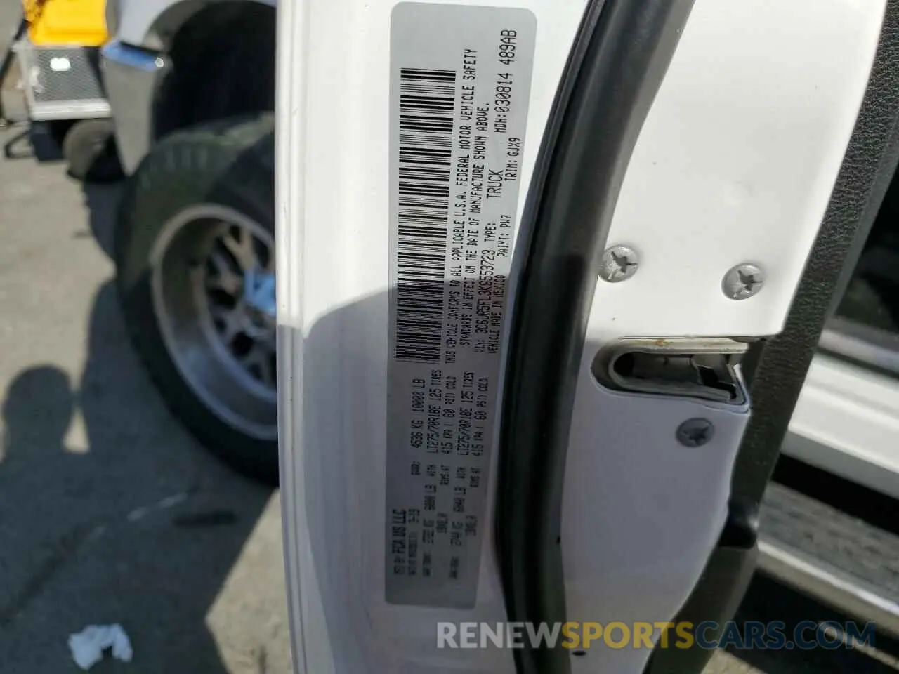 14 Photograph of a damaged car 3C6UR5FL3KG553723 RAM 2500 2019