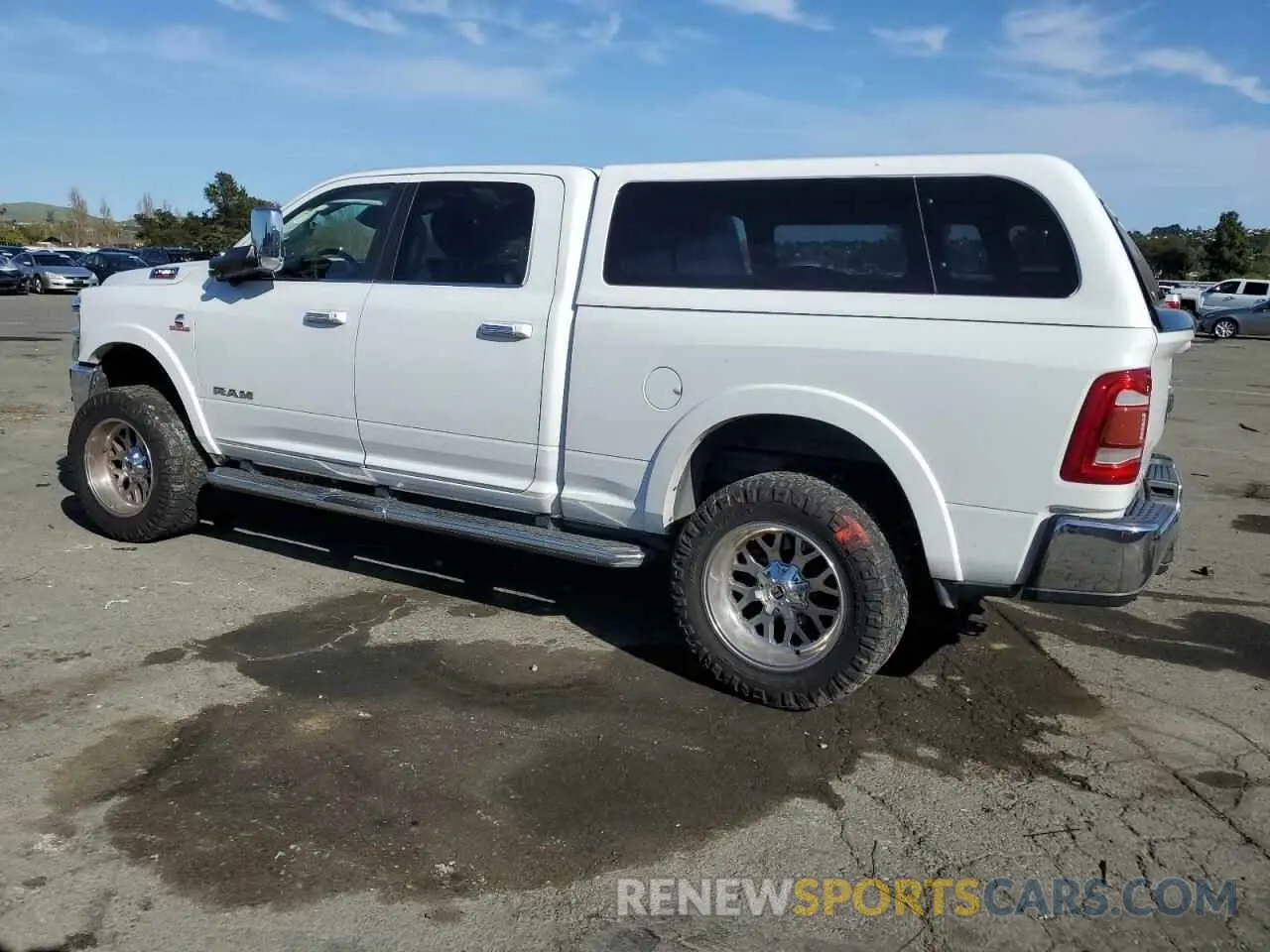 2 Photograph of a damaged car 3C6UR5FL3KG553723 RAM 2500 2019