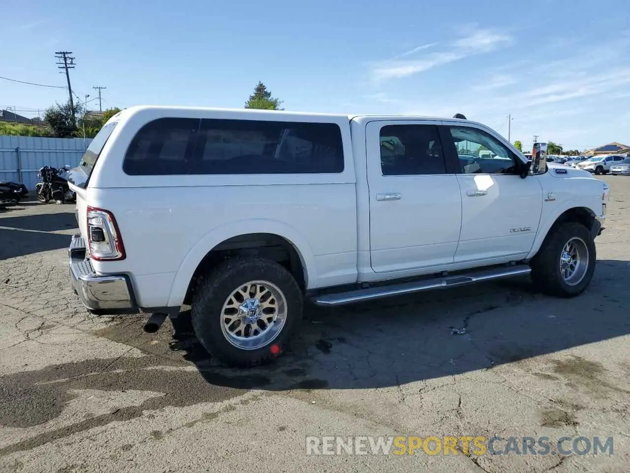 3 Photograph of a damaged car 3C6UR5FL3KG553723 RAM 2500 2019