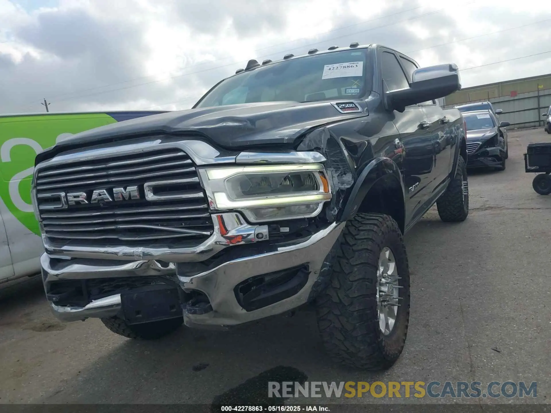 2 Photograph of a damaged car 3C6UR5FL3KG727452 RAM 2500 2019