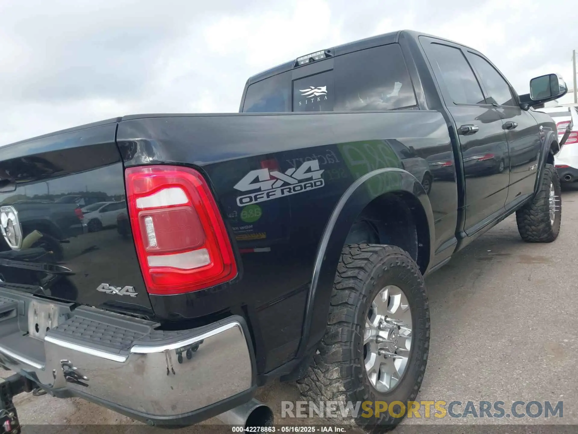 4 Photograph of a damaged car 3C6UR5FL3KG727452 RAM 2500 2019