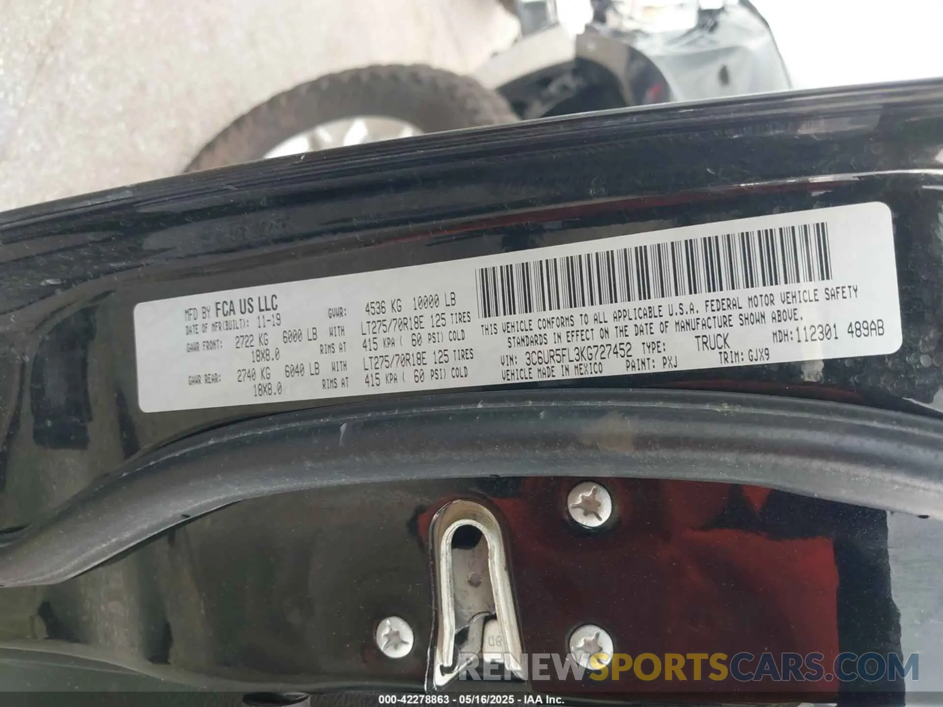 9 Photograph of a damaged car 3C6UR5FL3KG727452 RAM 2500 2019