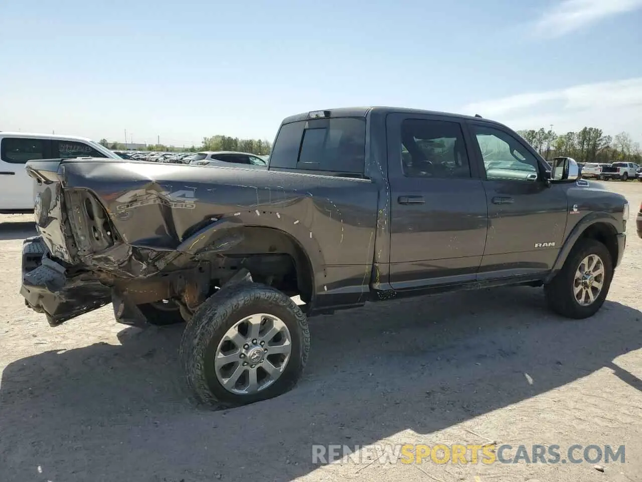 3 Photograph of a damaged car 3C6UR5FL5KG652706 RAM 2500 2019